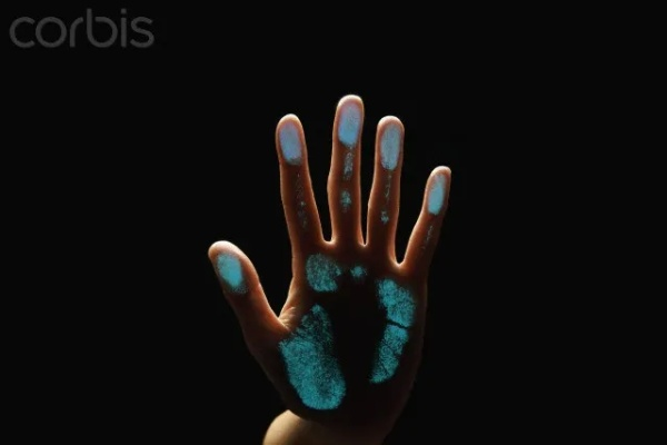 The Art of Detecting Human Handprints on Textiles